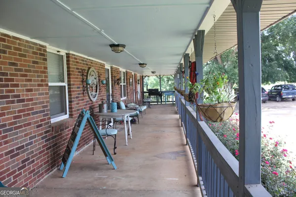 a view of a porch with chairs