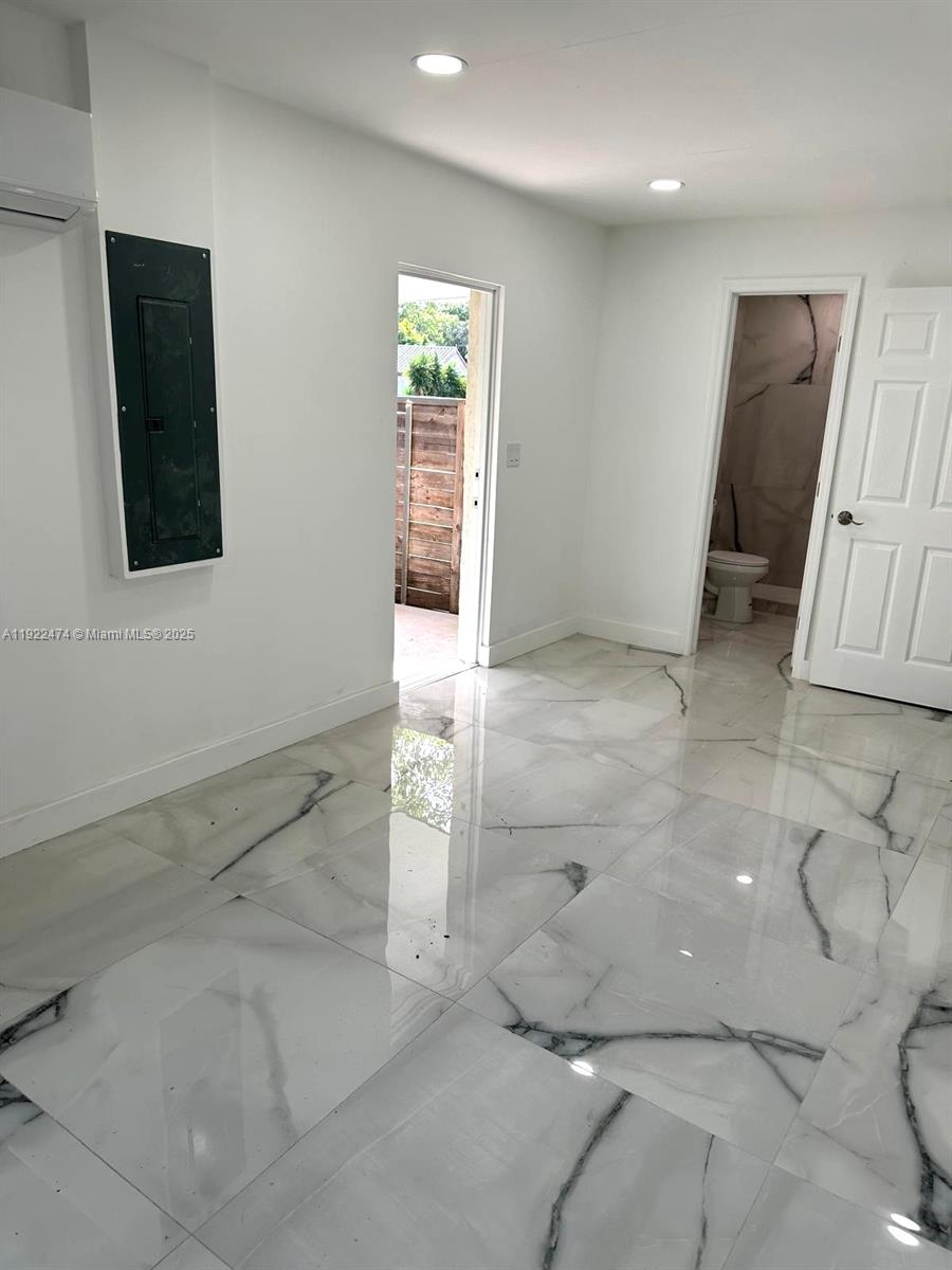 26205 Southwest 133rd Court, Unit 2 Homestead, FL 33032 - Photo 12 of 17 a view of a storage & utility room
