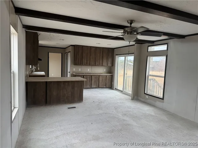 a view of kitchen and windows