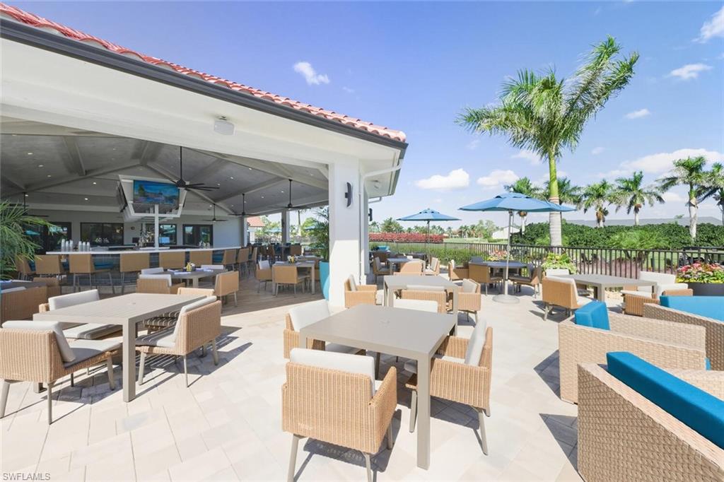 209 Countryside Drive Naples, FL 34104 - Photo 38 of 50 View of patio / terrace with an outdoor living / dining area and ceiling fan