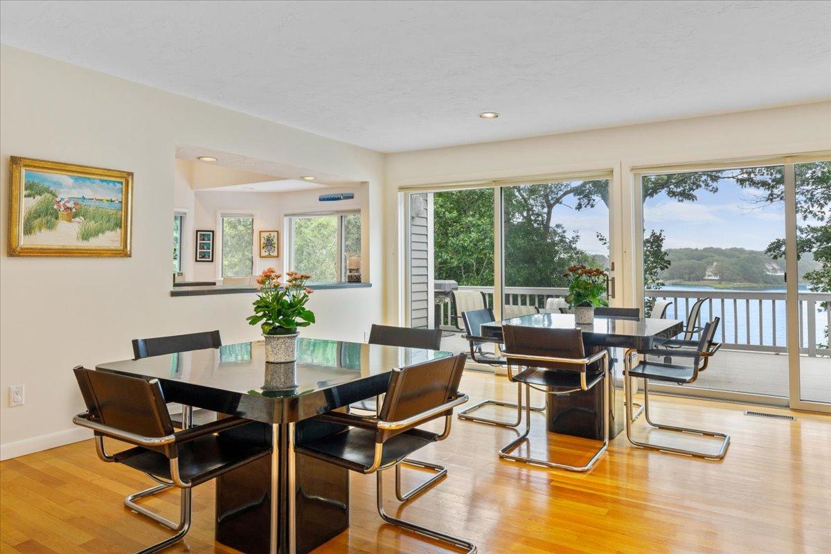 19 Ockway Bay Road Mashpee, MA 02649 - Photo 13 of 79 a dining room with furniture and wooden floor
