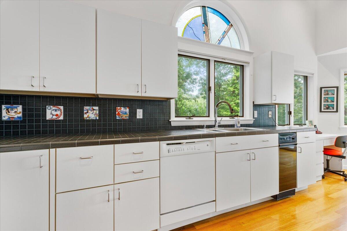 19 Ockway Bay Road Mashpee, MA 02649 - Photo 16 of 79 a kitchen with granite countertop a sink a stove and cabinets