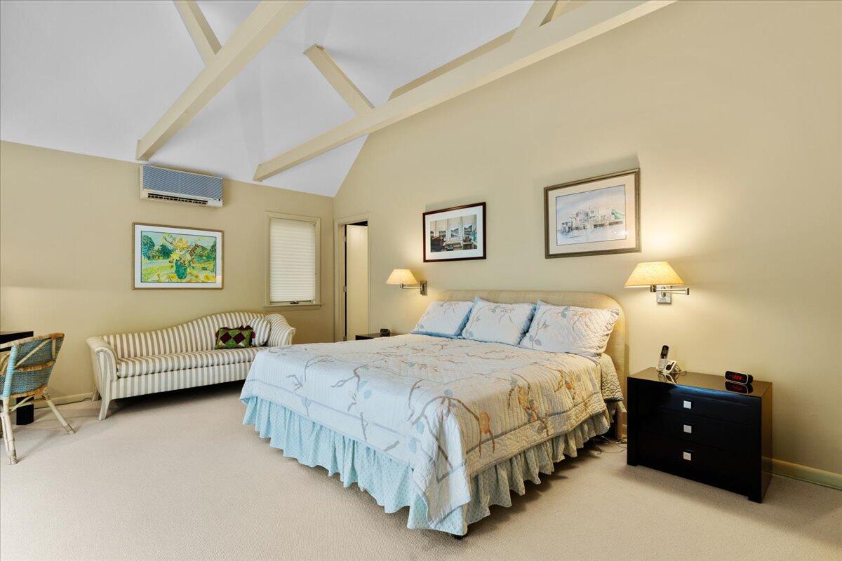 19 Ockway Bay Road Mashpee, MA 02649 - Photo 26 of 79 a bedroom with a bed and a night stand