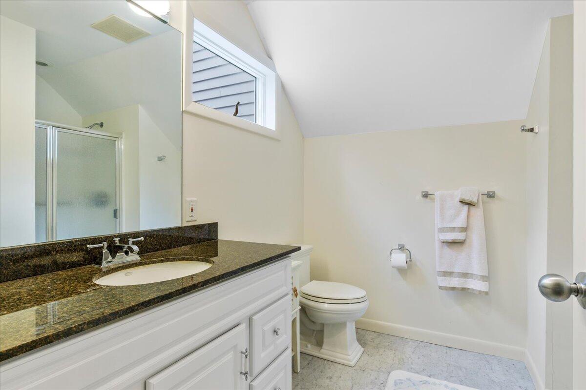19 Ockway Bay Road Mashpee, MA 02649 - Photo 30 of 79 a bathroom with a granite countertop sink a toilet and a mirror