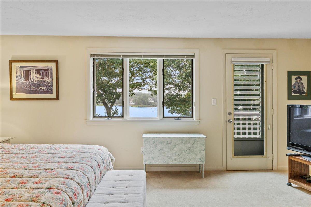 19 Ockway Bay Road Mashpee, MA 02649 - Photo 33 of 79 a bedroom with a bed and a television