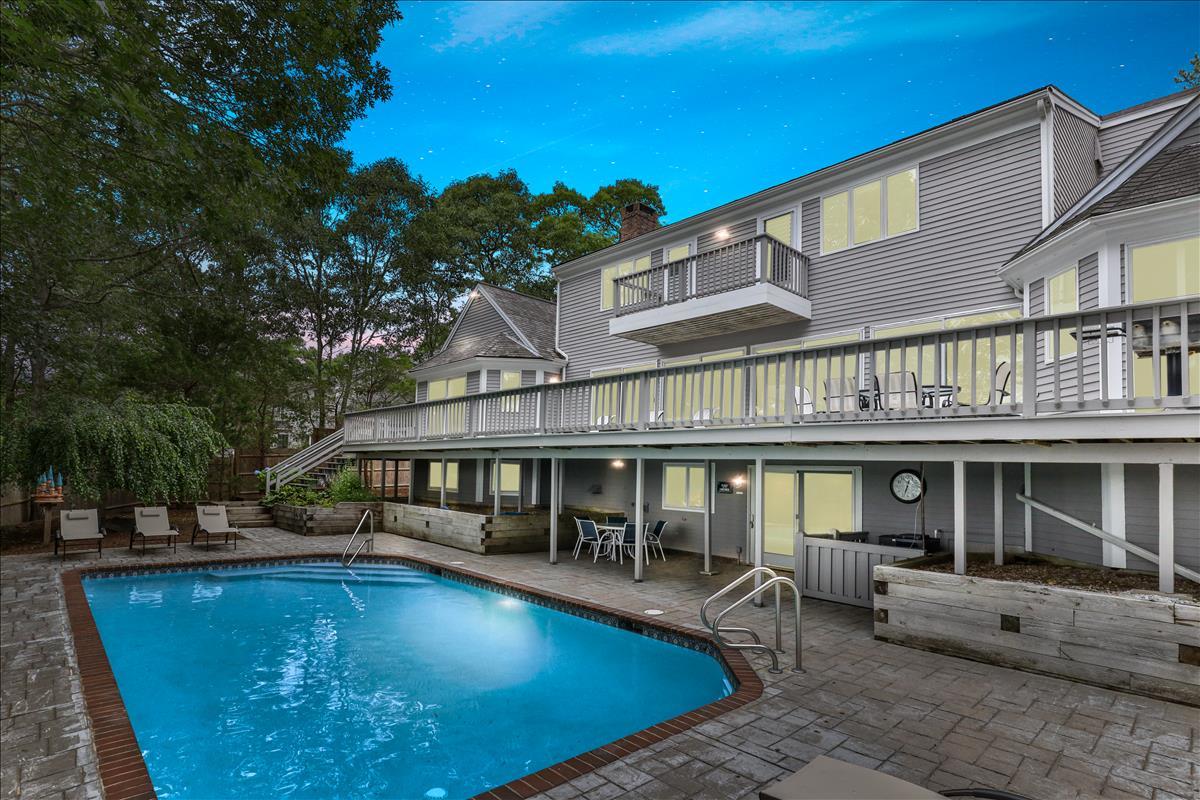 19 Ockway Bay Road Mashpee, MA 02649 - Photo 4 of 79 a view of a house with swimming pool and sitting area