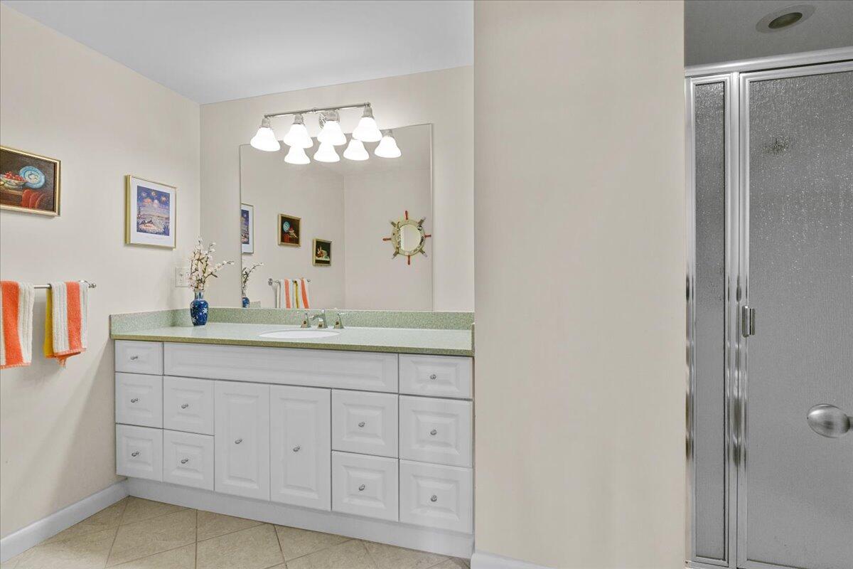 19 Ockway Bay Road Mashpee, MA 02649 - Photo 49 of 79 a bathroom with a double vanity sink and a mirror