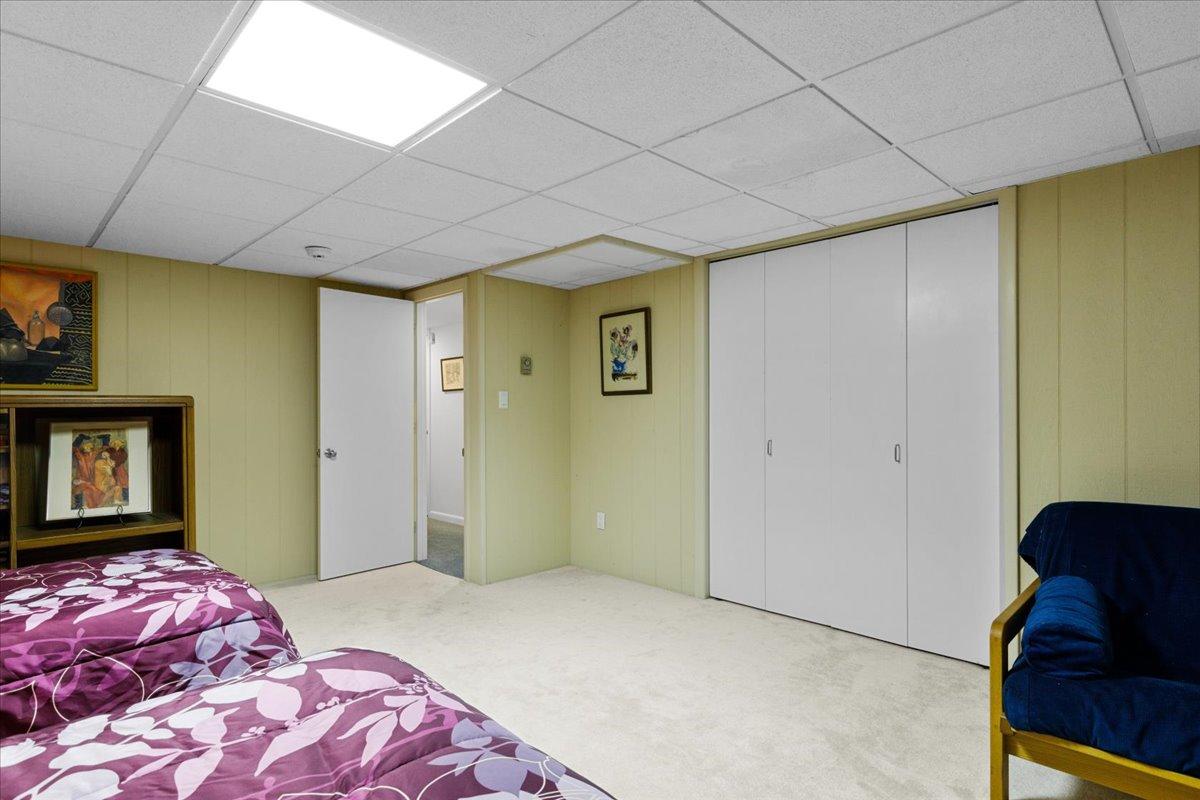 19 Ockway Bay Road Mashpee, MA 02649 - Photo 52 of 79 a bedroom with a bed and a dresser