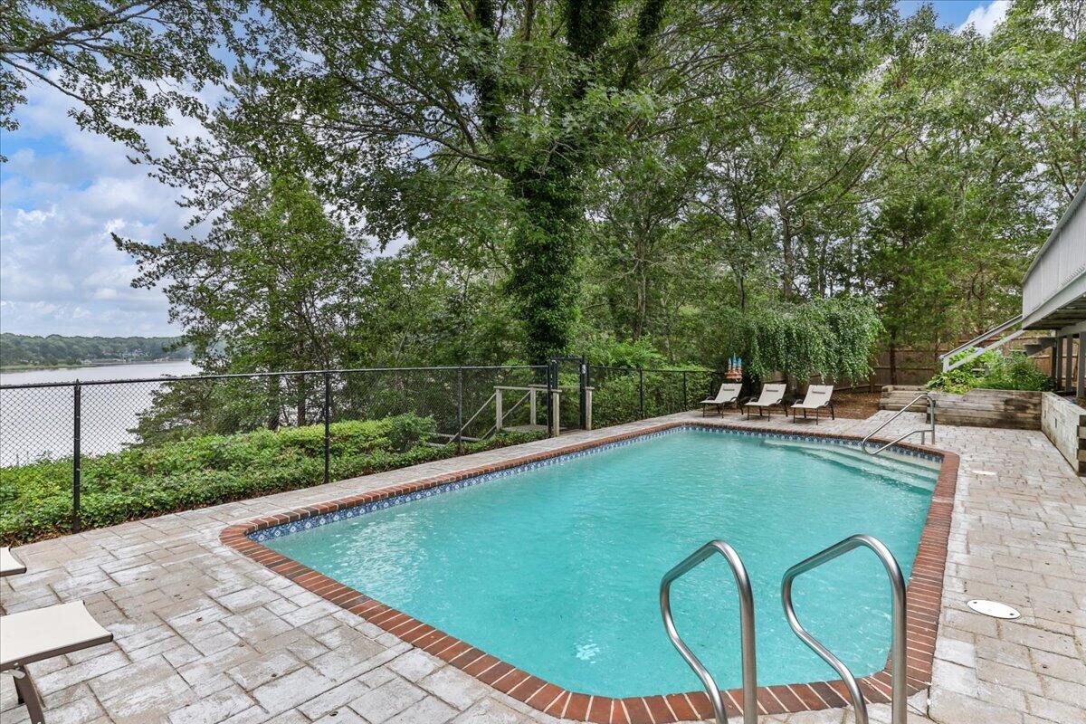 19 Ockway Bay Road Mashpee, MA 02649 - Photo 62 of 79 a view of a swimming pool with a outdoor seating