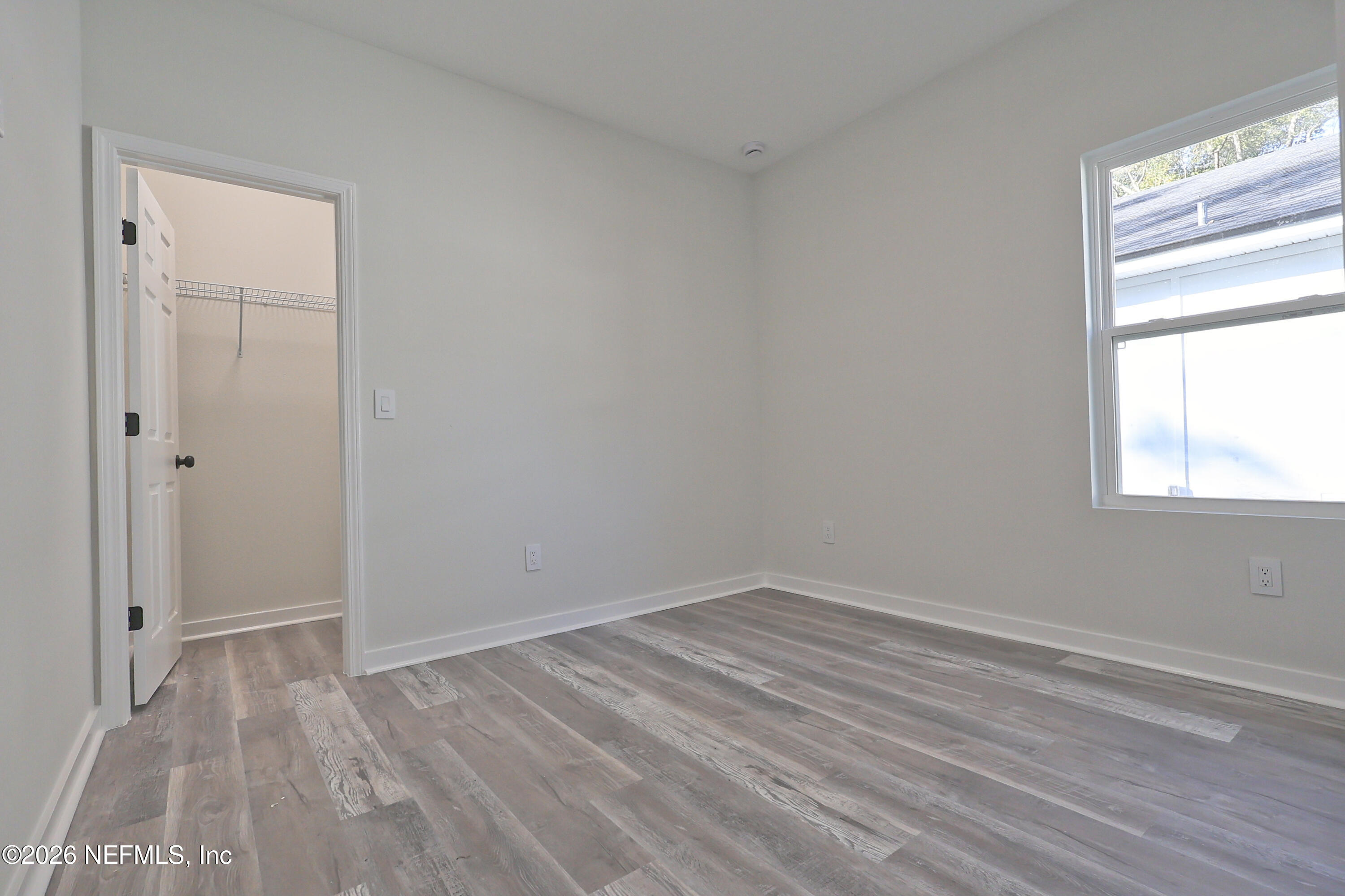 30 Delmonte Street Baldwin, FL 32234 - Photo 32 of 37 a view of a room that has a window in it