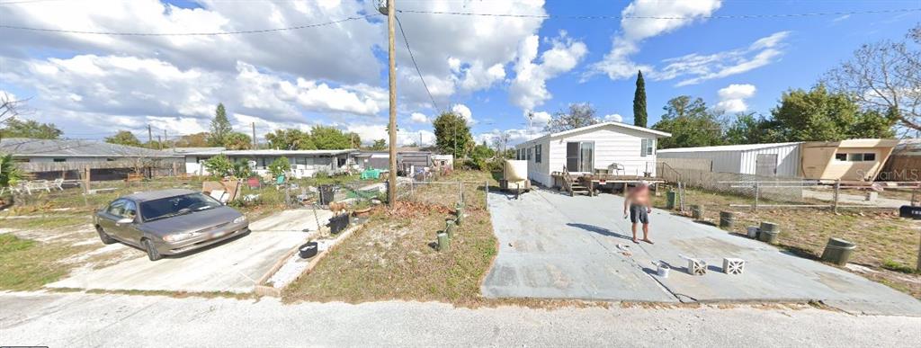 13012 Avon Street Hudson, FL 34667 - Photo 2 of 4 a view of a house with outdoor space