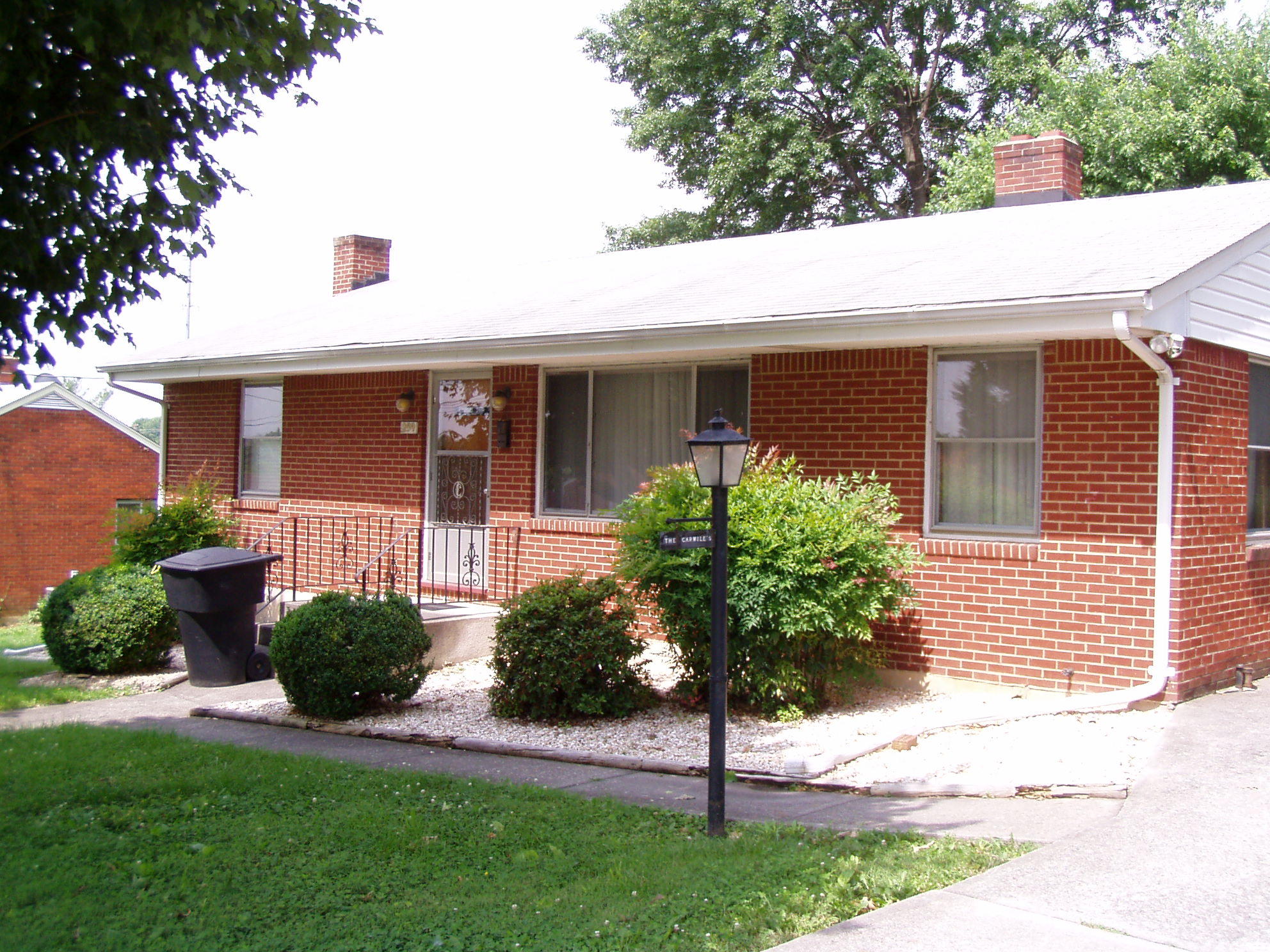 259 Knoll Road Roanoke, VA 24019 - Photo 1 of 1 a front view of a house with garden