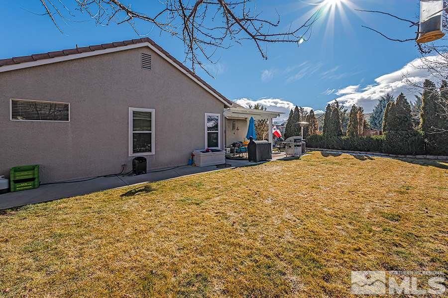 10155 Buckeye Court Reno, NV 89521 - Photo 17 of 17 a view of a house with a patio
