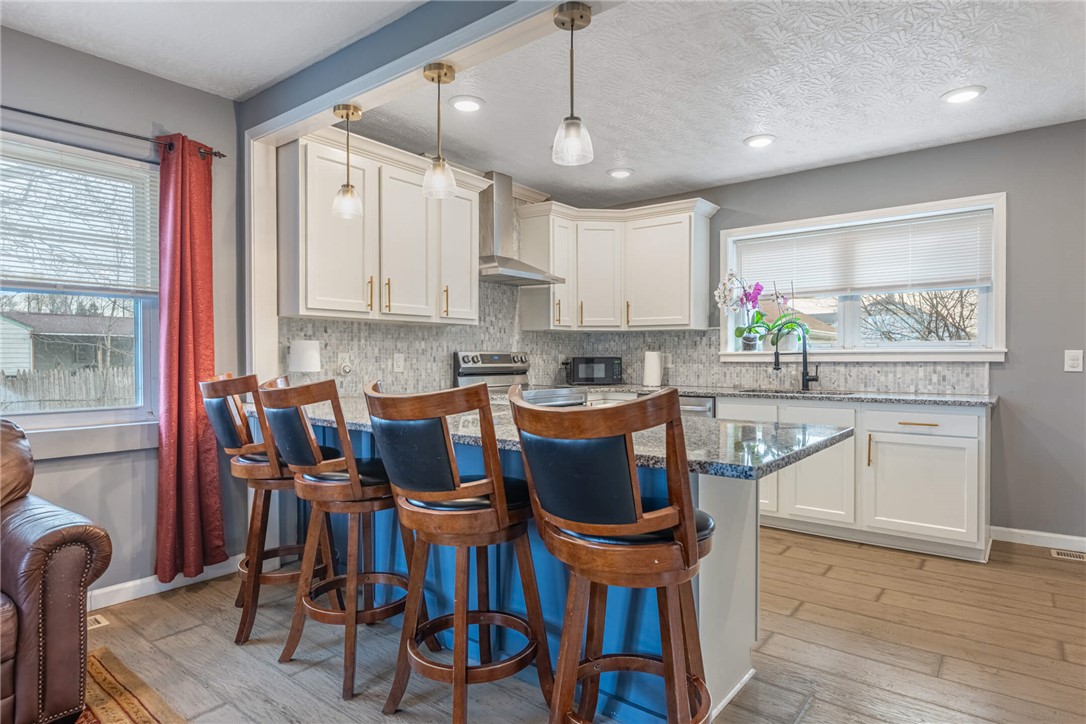 436 Marjorie Avenue Riverside, OH 45404 - Photo 10 of 34 This bright kitchen features sleek appliances and ample counter space for culinary adventures.