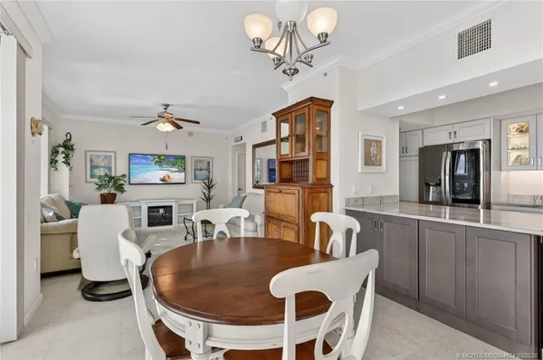 a kitchen with appliances cabinets and a sink