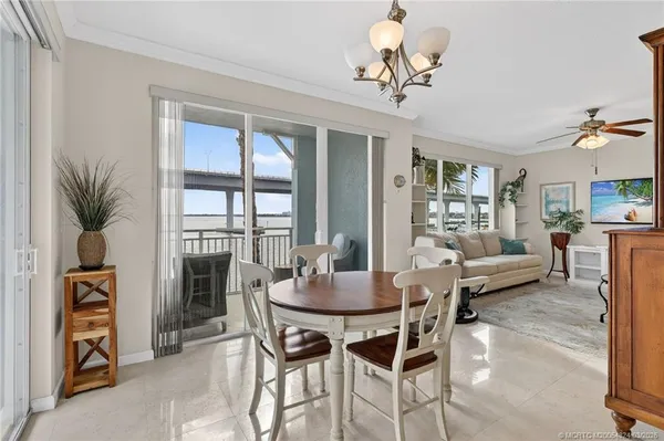 a kitchen with stainless steel appliances granite countertop a sink stove and microwave