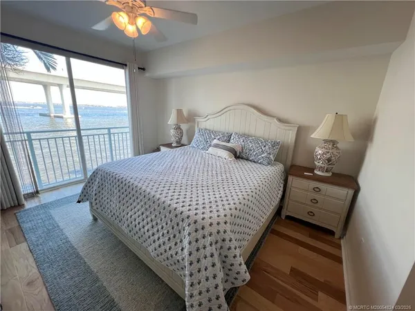 a view of a chairs and table in patio