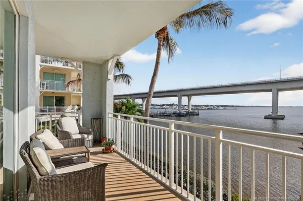 a view of a car parked in front of a house
