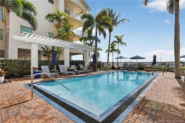 an aerial view of a house with a lake view