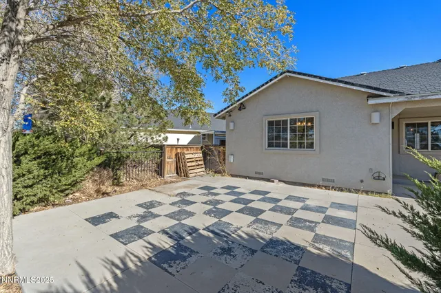 a house with trees in front of it