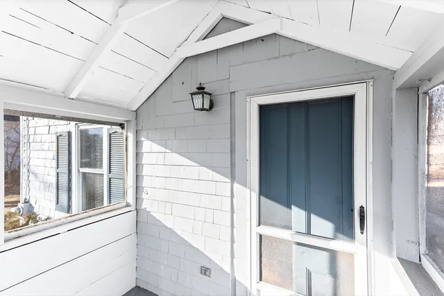 a view of a house with a large window