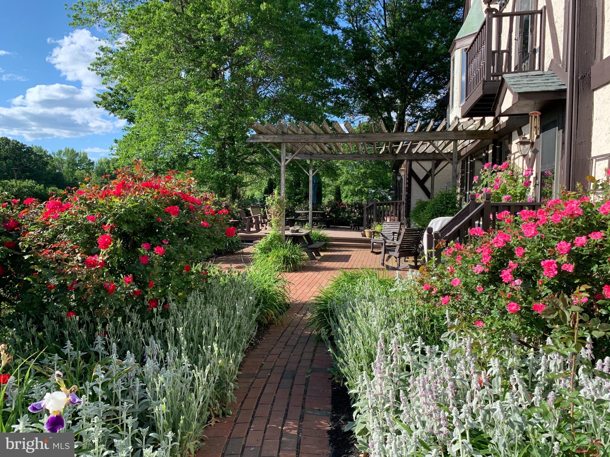 48 Harker Road Chesterfield, NJ 08515 - Photo 27 of 30 a picture of flowers outside the house