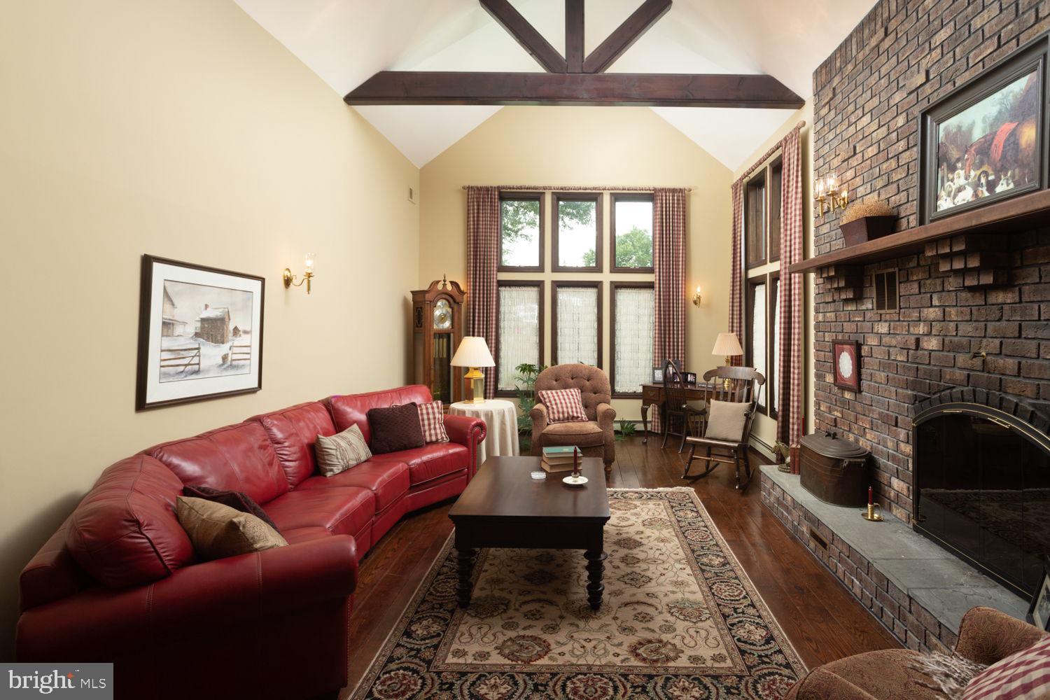 48 Harker Road Chesterfield, NJ 08515 - Photo 4 of 30 a living room with furniture or couch and a fireplace