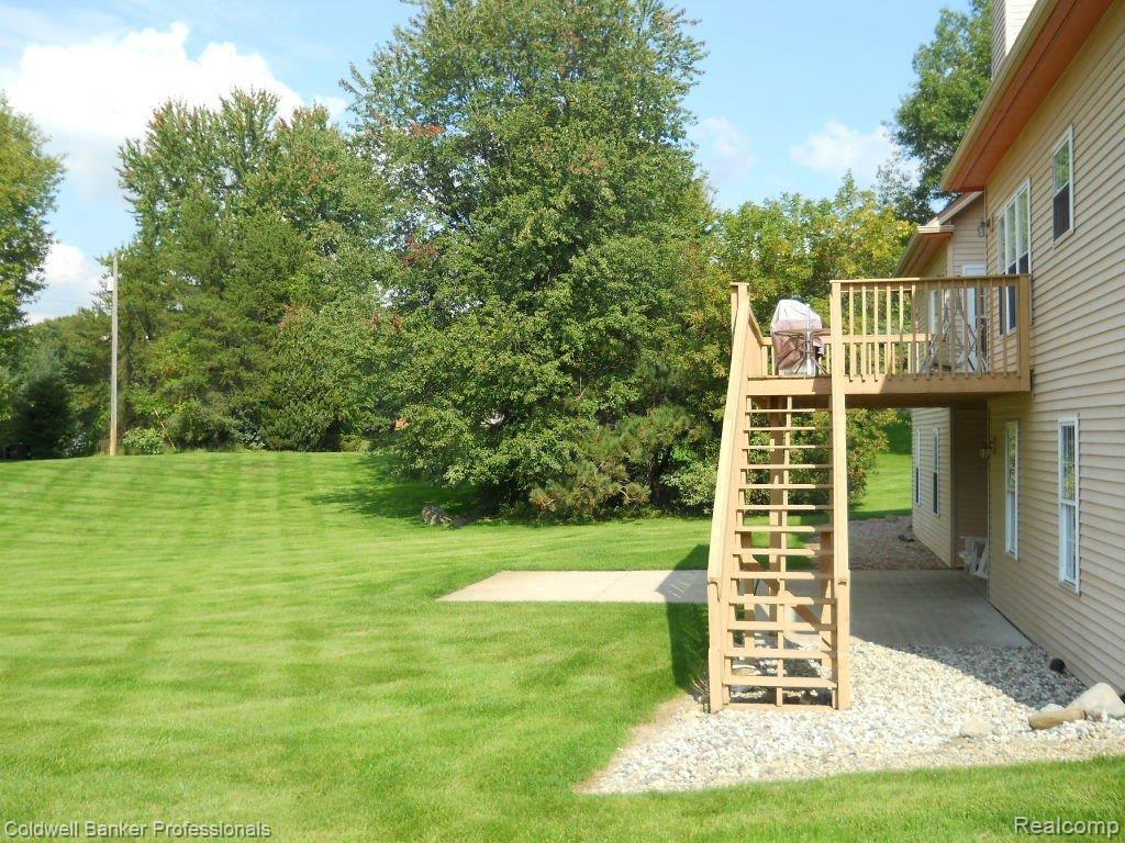 1843 East Coon Lake Road Howell, MI 48843 - Photo 22 of 25 coon-lake-backyard.jpg