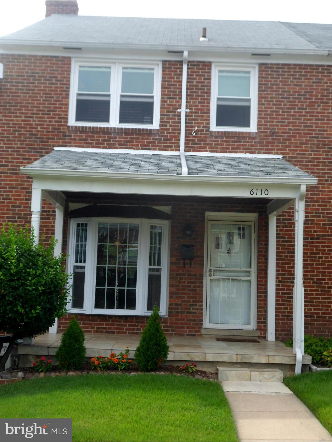 6110 Marlora Road Baltimore, MD 21239 - Photo 1 of 22 a front view of a house with garden