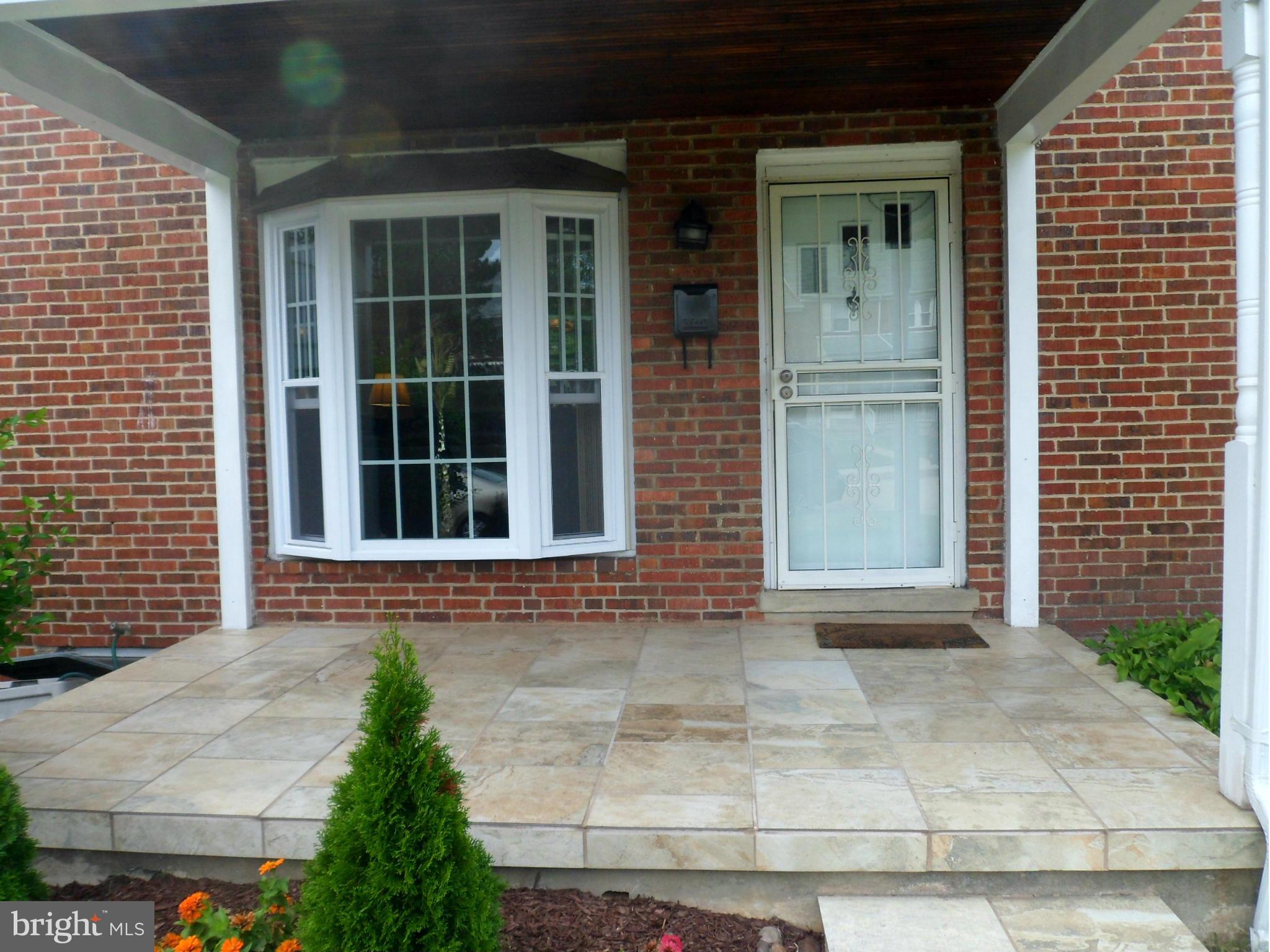6110 Marlora Road Baltimore, MD 21239 - Photo 2 of 22 a front view of a house