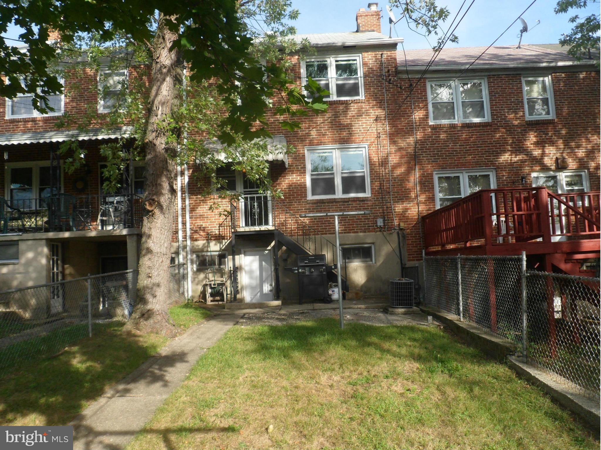 6110 Marlora Road Baltimore, MD 21239 - Photo 14 of 22 front view of house with a yard