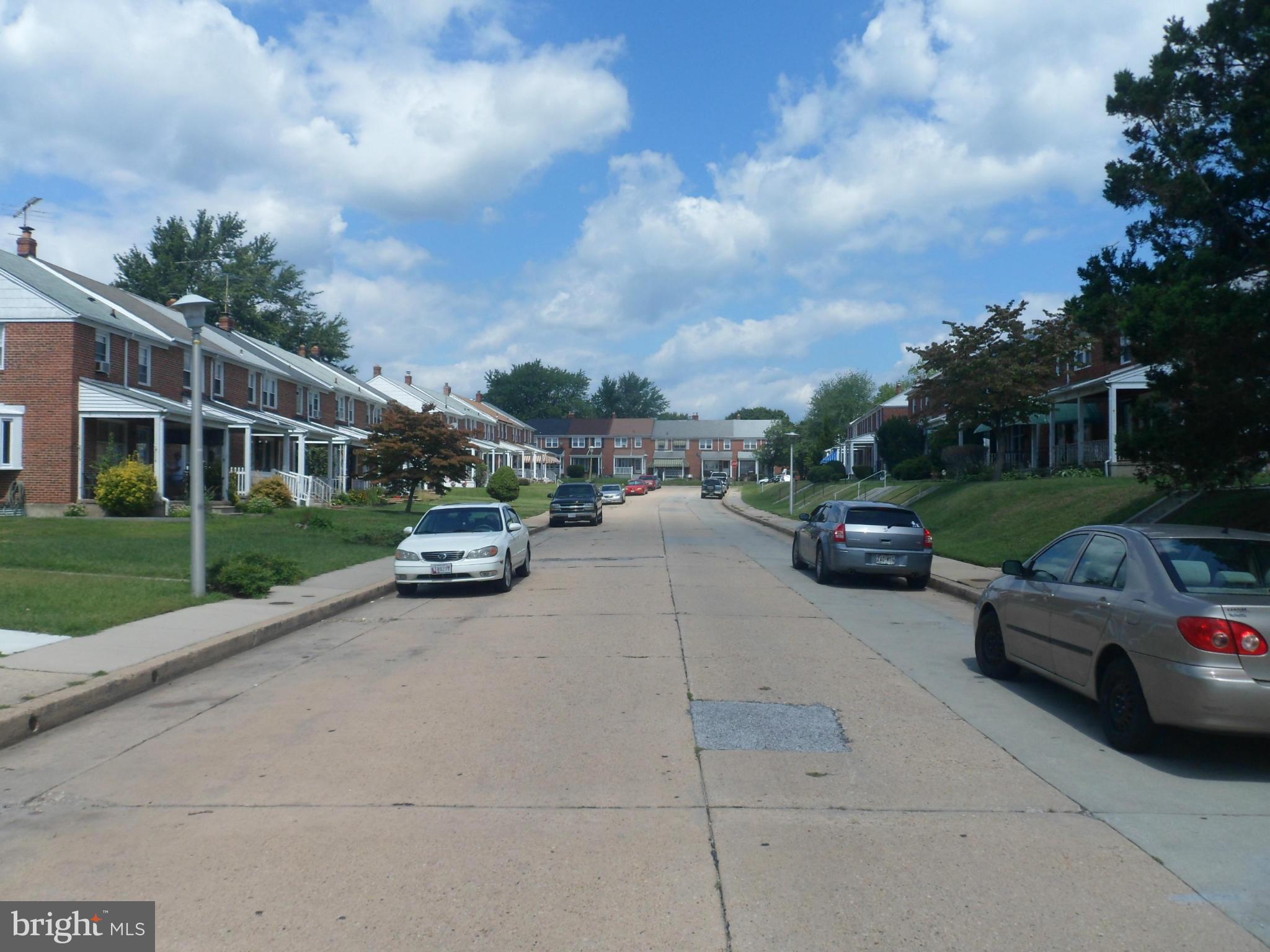 6110 Marlora Road Baltimore, MD 21239 - Photo 17 of 22 a car parked on the side of the road