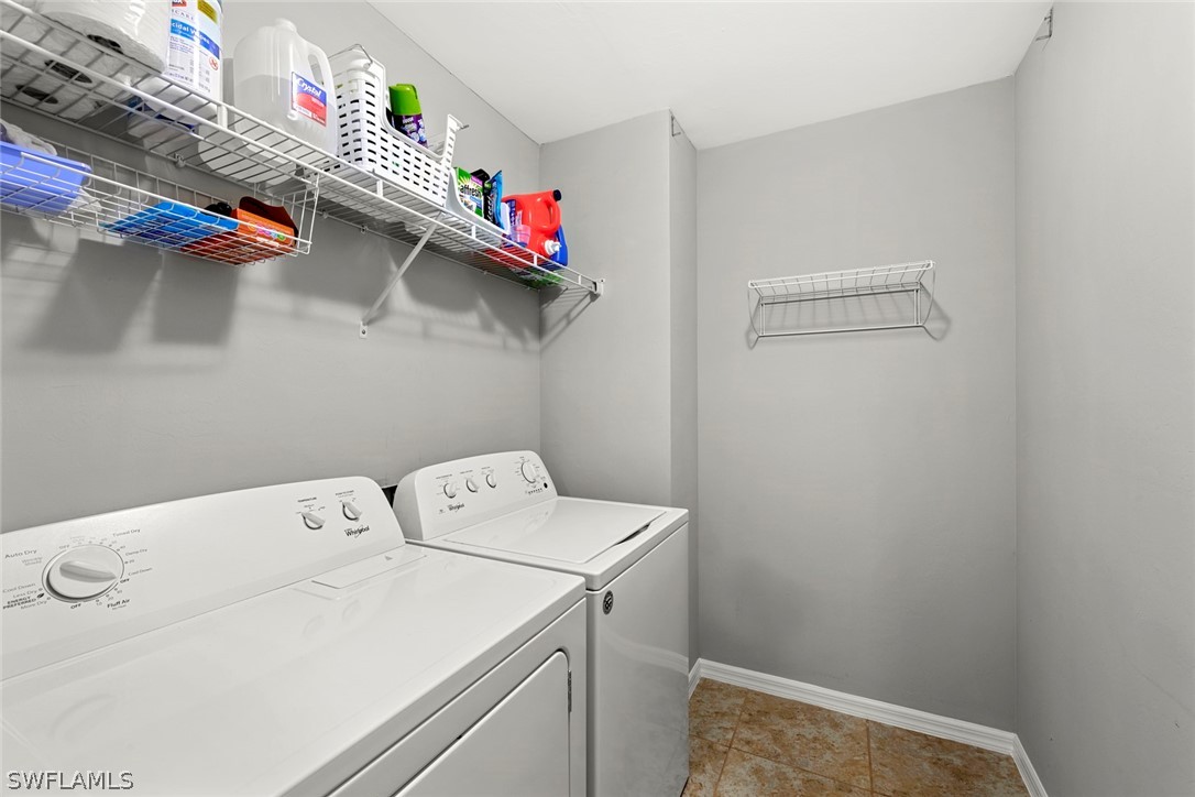 3849 Tilbor Circle Fort Myers, FL 33916 - Photo 19 of 28 a utility room with dryer and washer