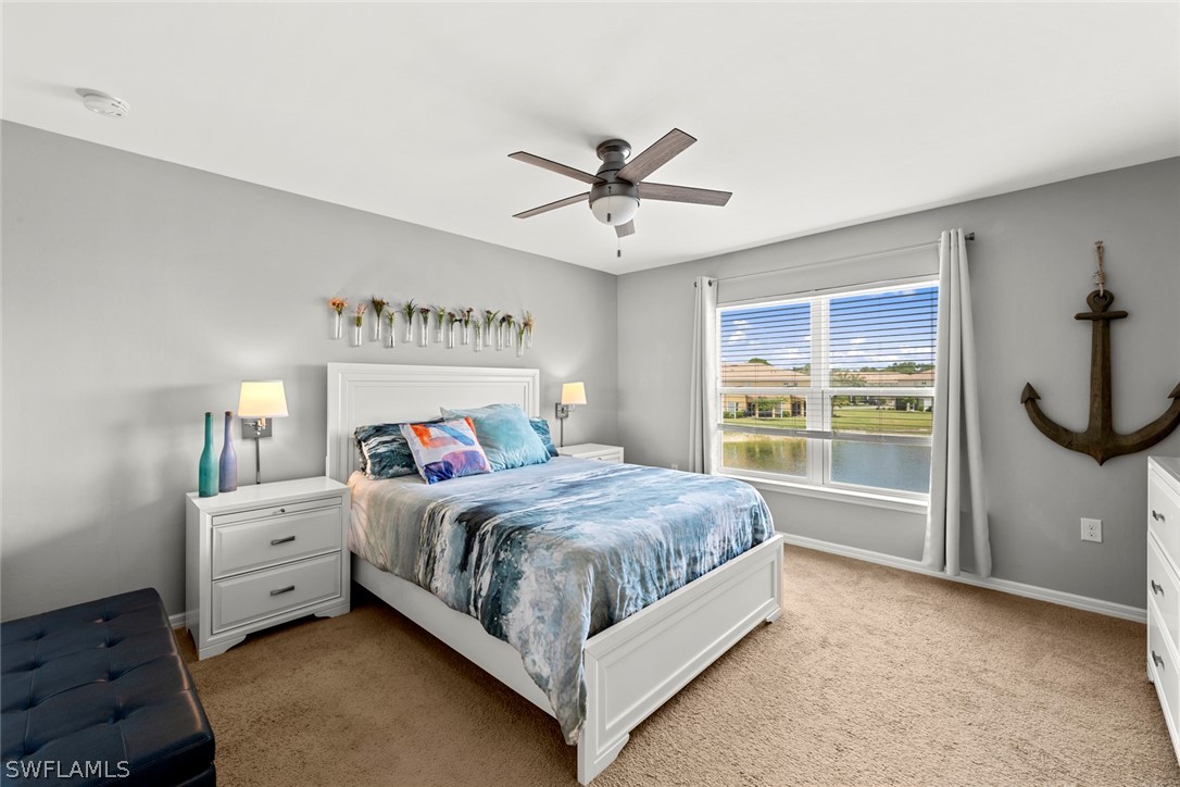 3849 Tilbor Circle Fort Myers, FL 33916 - Photo 20 of 28 a bed room with a bed and a window