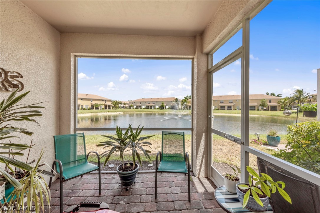 3849 Tilbor Circle Fort Myers, FL 33916 - Photo 25 of 28 a view of a balcony with chairs and a table