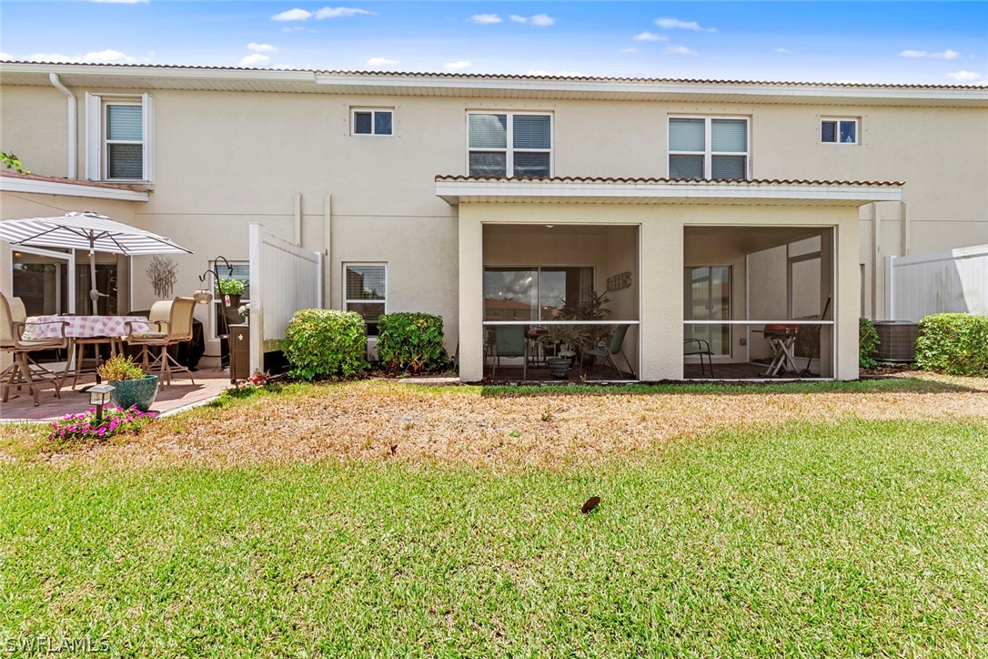 3849 Tilbor Circle Fort Myers, FL 33916 - Photo 28 of 28 a view of a house with backyard porch and sitting area