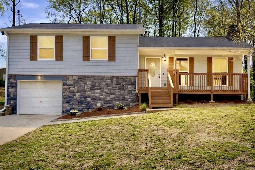 636 Hardy Way Hiram, GA 30141 - Photo 1 of 27 front view of a house with a yard