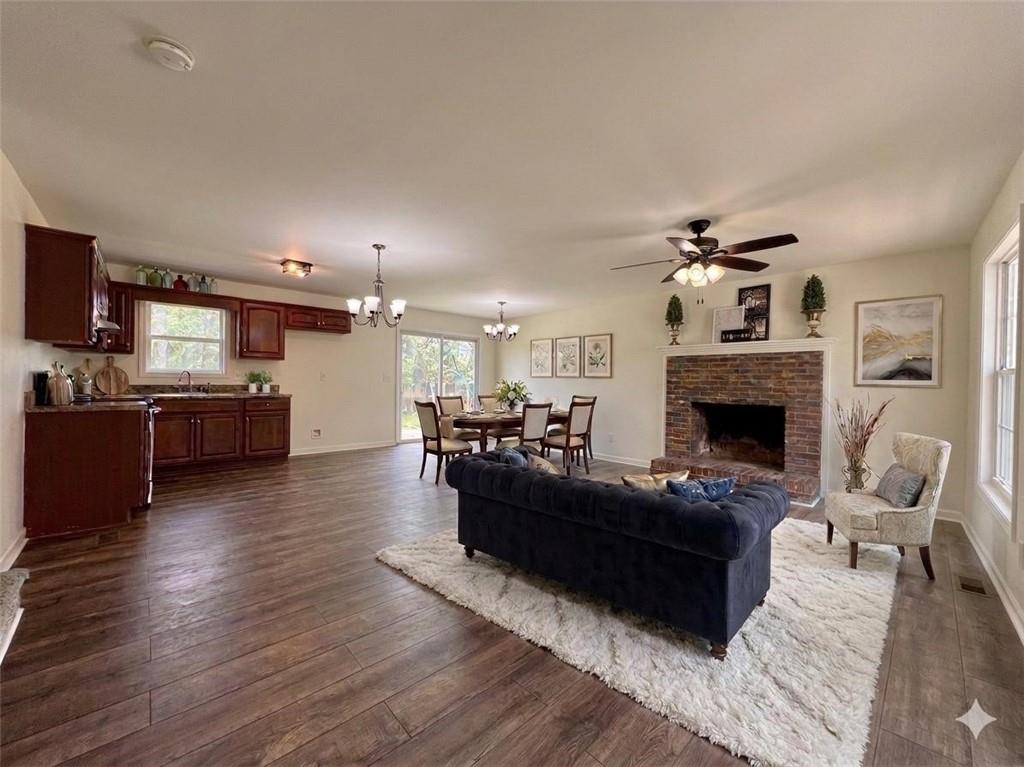 636 Hardy Way Hiram, GA 30141 - Photo 3 of 27 a living room with furniture fireplace and flat screen tv