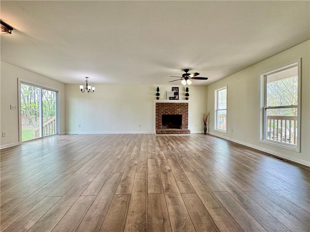636 Hardy Way Hiram, GA 30141 - Photo 5 of 27 a view of empty room with wooden floor and fan