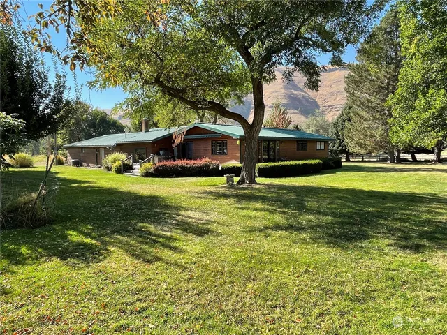 a view of a house with a swimming pool