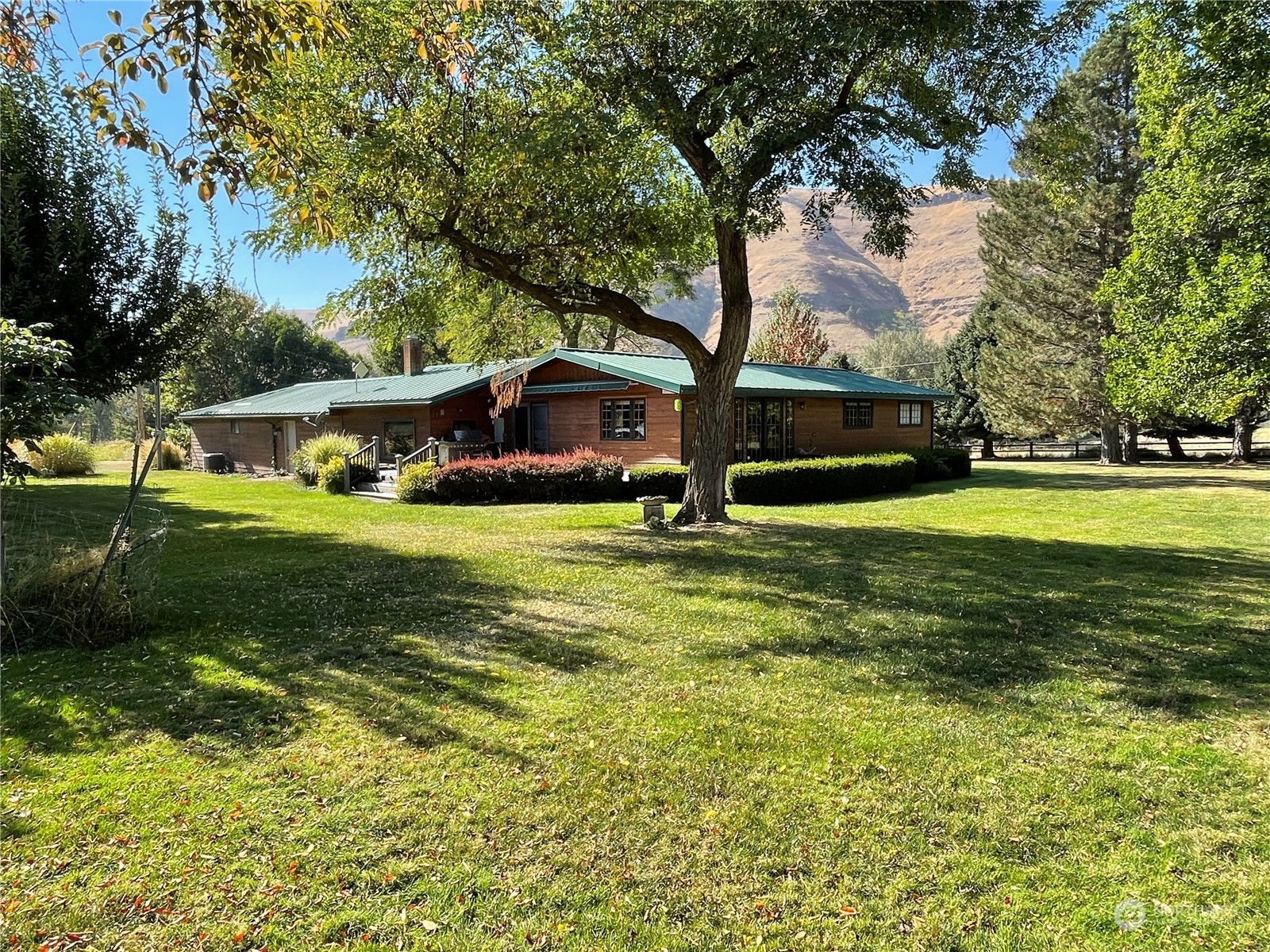 a view of a house with a swimming pool
