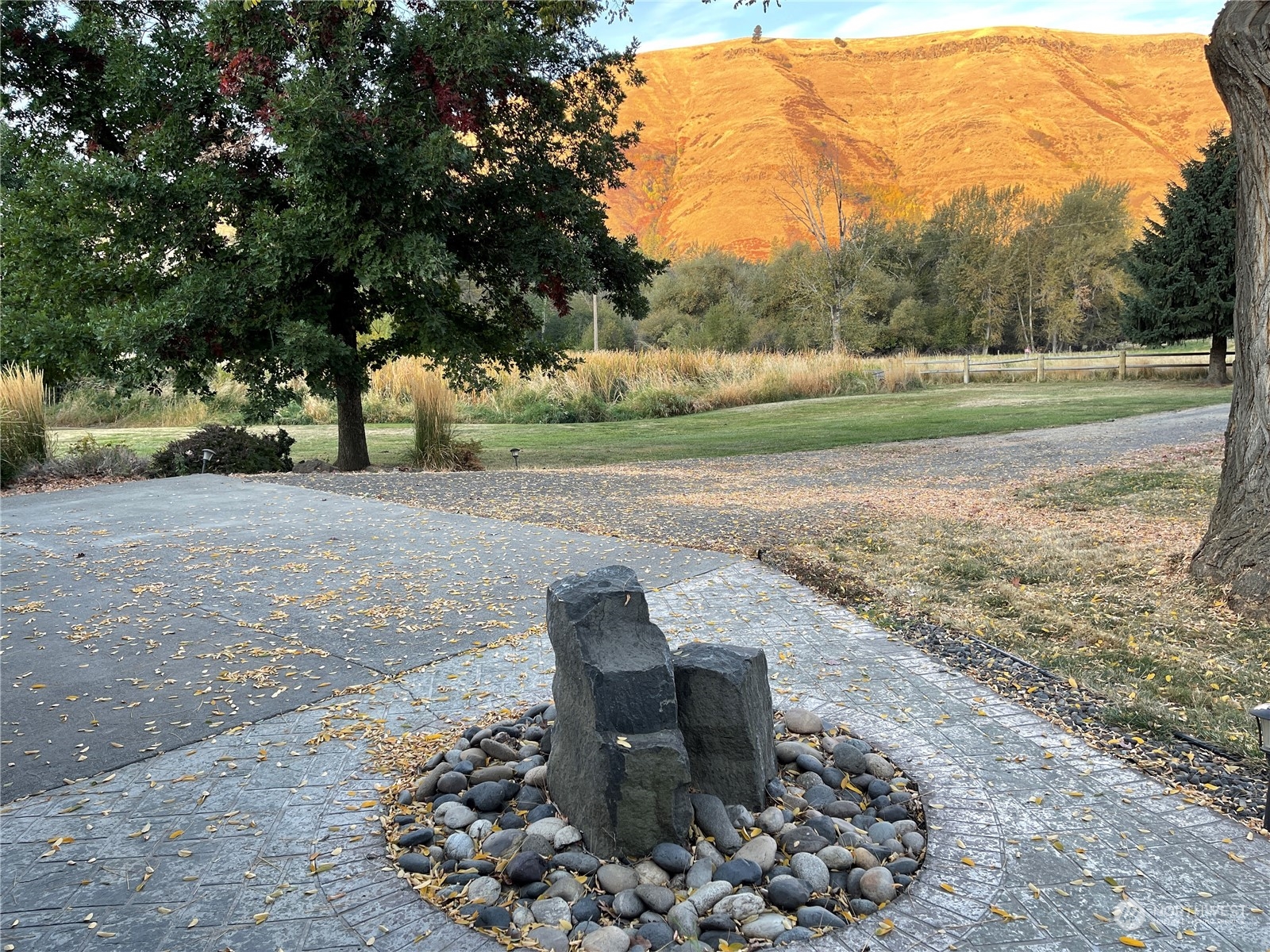 103 Wolf Fork Road Dayton, WA 99328 - Photo 39 of 40 a view of a backyard with wooden fence
