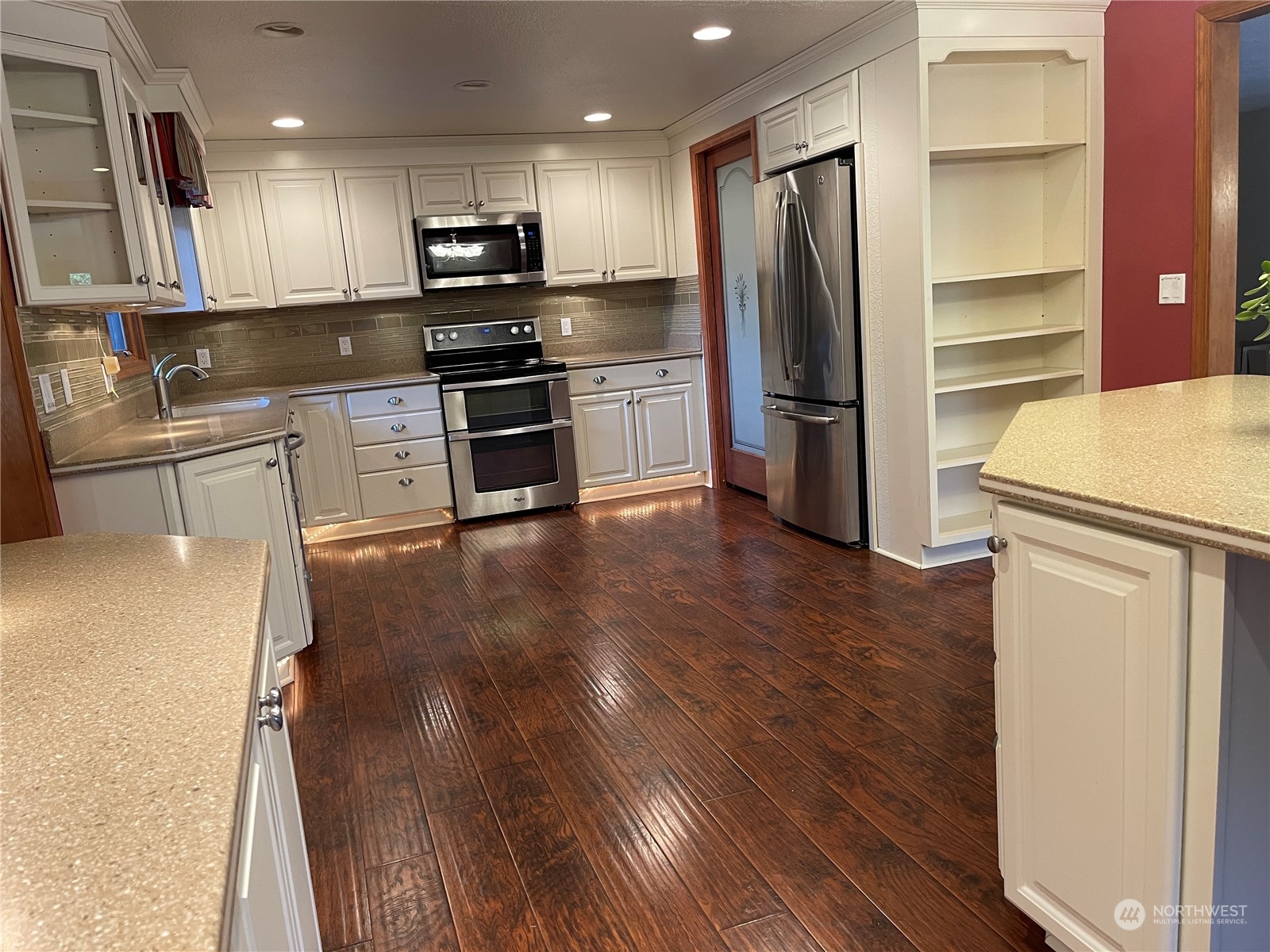 103 Wolf Fork Road Dayton, WA 99328 - Photo 5 of 40 a kitchen with stainless steel appliances granite countertop a refrigerator sink and stove