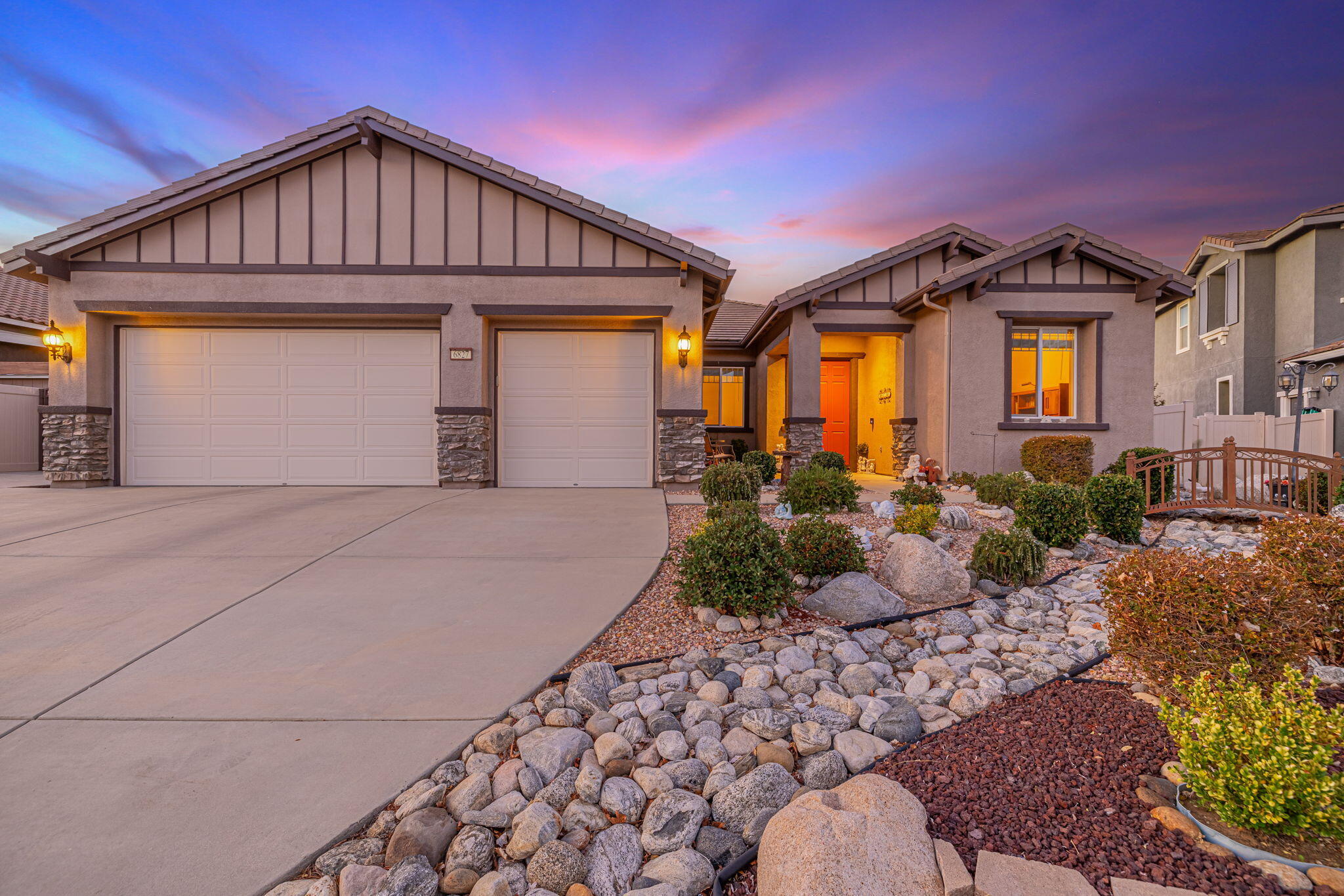 6827 Cabernet Road Palmdale, CA 93551 - Photo 14 of 50 a front view of a house with garden