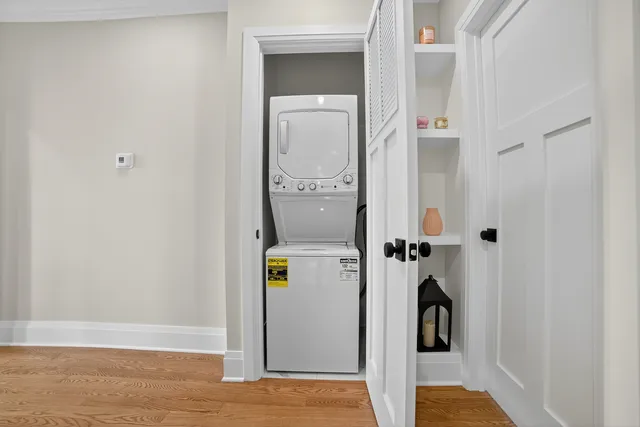 a bathroom with a tub and mirror