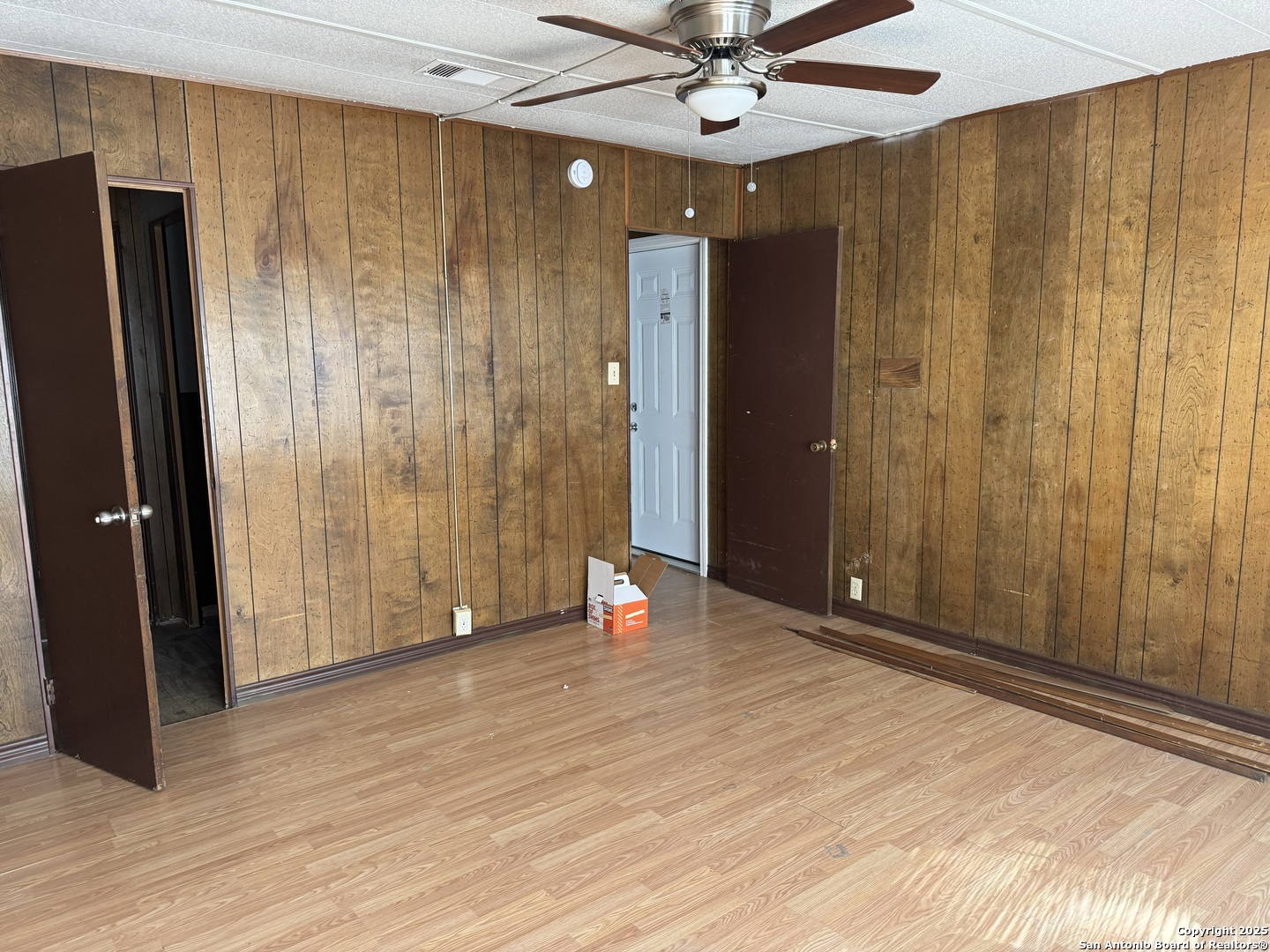 8455 Northmont Drive San Antonio, TX 78239 - Photo 12 of 14 an empty room with wooden floor and entryway
