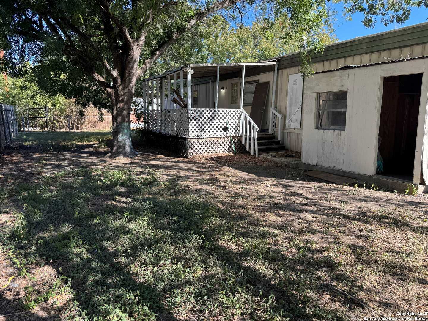 8455 Northmont Drive San Antonio, TX 78239 - Photo 14 of 14 a view of a house with a tree in the background