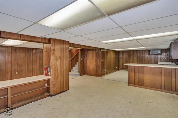 a view of room with furniture and a window