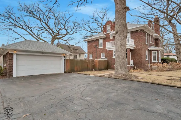 a view of a house with a snow in front of it