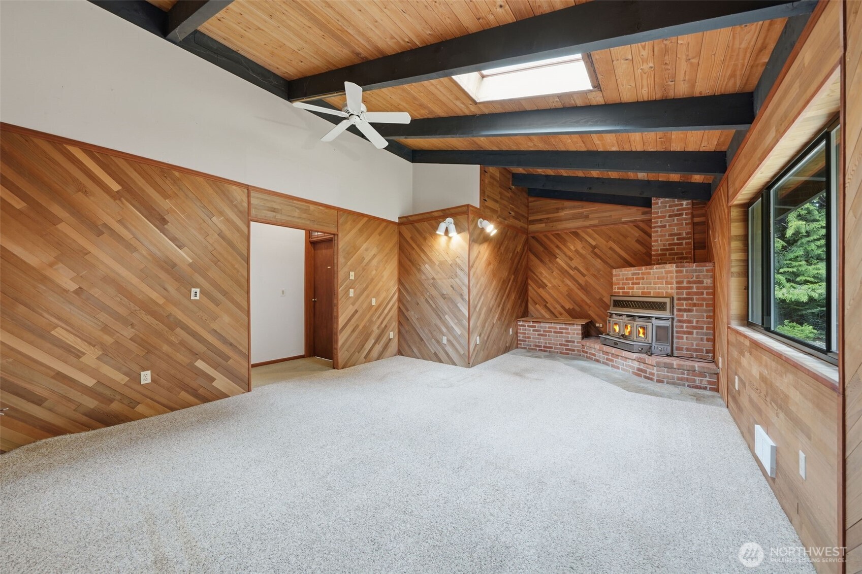 102 Byron Road Friday Harbor, WA 98250 - Photo 13 of 40 a view of a room with wooden walls